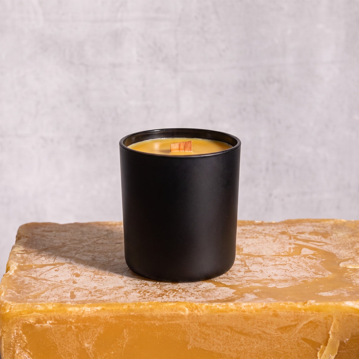 Rad Wax beeswax candle in black glass