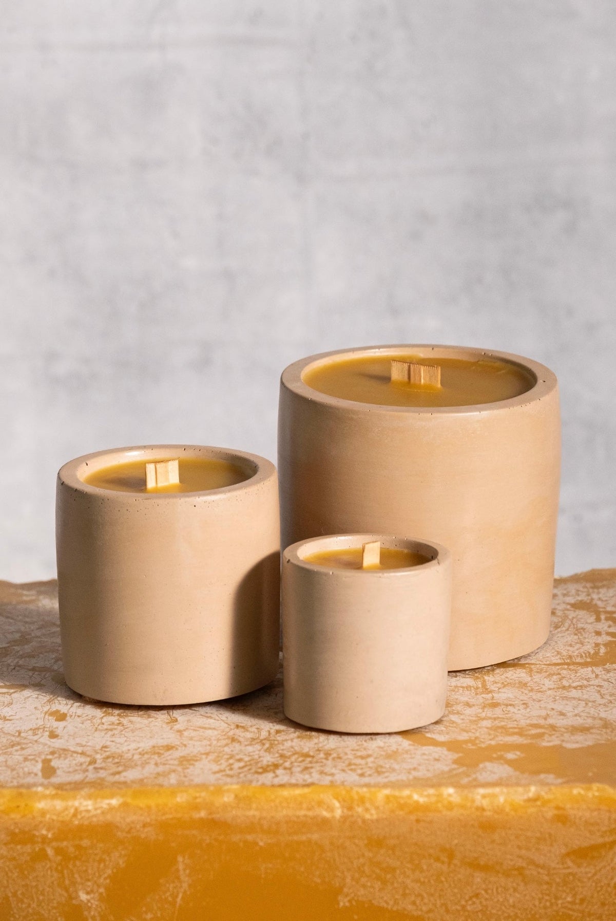 Rad Wax beeswax candle in Sand cement