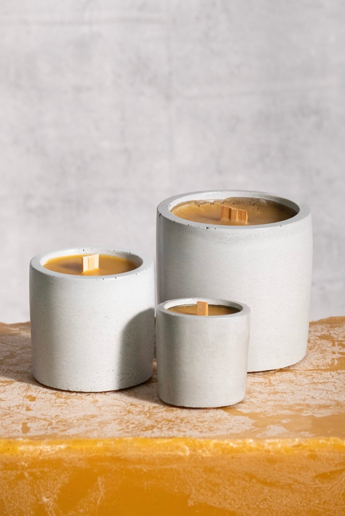 Rad Wax beeswax candle in Cement